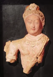Head and bust of a Bodhisattva in princely costume, from Kumtura, Xinjiang