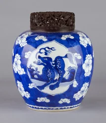 Jar with cover and dragon design