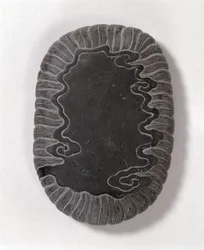 Inkstone carved with wave patterns, probably Ming dynasty