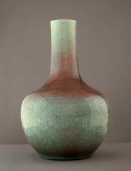 Coloured glazed vessel