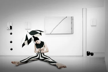 Striped Figure With Umbrella
