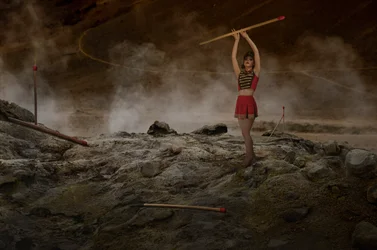 Woman With Giant Matchstick
