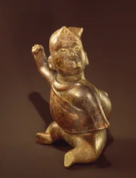 Horned figure vessel