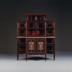 An ivory inlaid rosewood-veneered cabinet