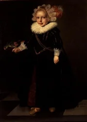 Girl wearing a black dress with feather headdress
