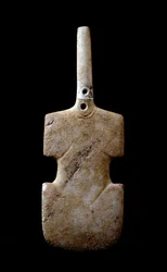 Statuette in the form of violin. Marble idol from Paros. 3000 BC. Cycladic Civilization. Athens, National Archaeological Museum
