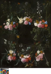 Sculpted cartouche adorned with flower garlands