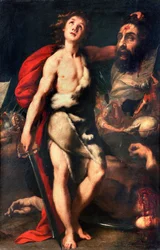David Winner of Giant Goliath Holds His Head in Hand