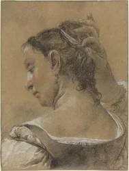 A Young Woman Fixing Her Hair