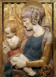 Virgin and Child, ca 1440, by Donatello, painted and gilded terracotta relief