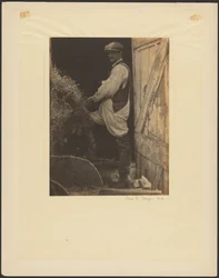 Man with Mustache and Cap in the Doorway of a Barn