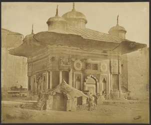 Building with Tent and Horse