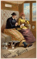 Man Offering Chocolate to Woman on Train