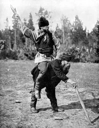 Finns playing Kyykkä, the national game, 1936