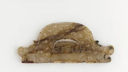 Semi-circular plaque with dragon heads at ends, 5th-4th century BC