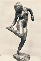 Dancer Looking at the Sole of Her Right Foot