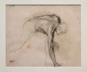 Naked Man Leaning Picking Up an Object