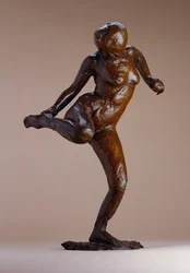 Nude Looking at the Sole of Her Right Foot