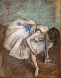 Sitting Dancer Massaging Her Foot