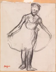 Standing Dancer Holding Tutu Skirt