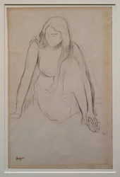 Woman Sitting at the Water