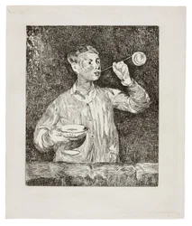 Boy Blowing Soap Bubbles