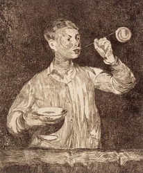 Boy Blowing Soap Bubbles