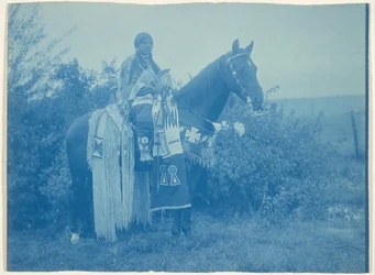 [Cayuse Woman on Horseback]