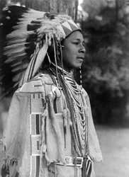 Youth in holiday costume, Umatilla, photo Edward S. Curtis