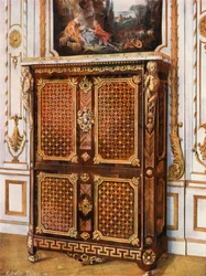 Upright Secretaire in Parqueterie of Various Woods, with Ormolu-Mounted Rosettes
