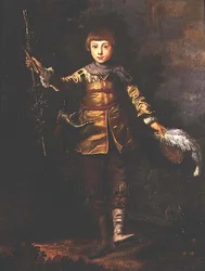 Portrait of a young boy dancing in a wood
