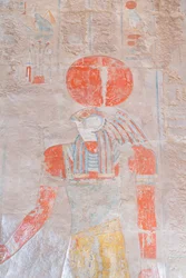 Bas relief carving of the sun god Ra, Hatshepsut temple of Deir Al Bahari, Luxor, Egypt