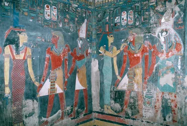 Egypt, Thebes, Luxor, Valley of the Kings, Tomb of Horemheb, Mural painting depicting Horemheb between goddess Isis and god Horus, New Kingdom, Dynasty XVIII