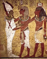 Egyptian Antiquity: The Pharaoh Tutankhamun Facing the God Osiris