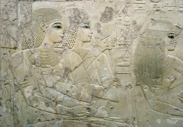 Egyptian antiquity: bas relief representing the guests of a funeral banquet - Tomb of the Vizier Ramose (18th dynasty) - Luxor, Thebes, Tomb of the Nobles Egypt - Egyptian civilization: Bas relief depicting the guests at a funeral banquet, from the Tomb of
