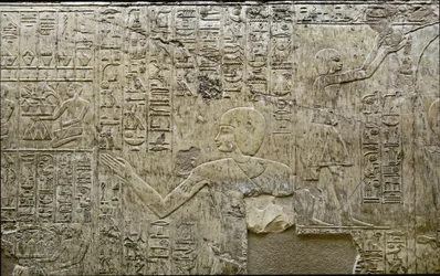 Egyptian antiquity: representation of bearers of offerings. Low relief of the Tomb of the Vizir Ramose (18th dynasty). Luxor, Thebes, Valley of the Nobles Egypt