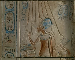 Egyptian Engravement Representing Akhenaten and Nefertiti Worshipping Solar Disc