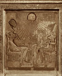 Royal family life: Pharaoh Amenophis IV Akhnaton, Queen Nefertiti, and 3 daughters praying to the sun