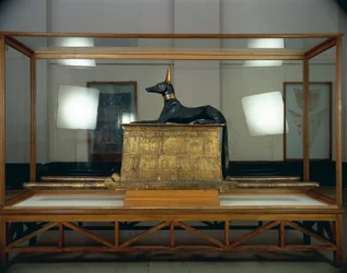 Treasure of Tutankhamen, wooden statue of jackal god Anubis upon a gilded chest