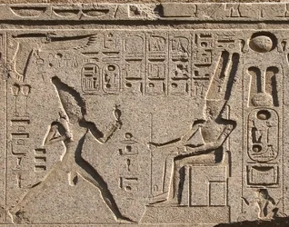 Egyptian Antiquity: Detail of the Architrave Decorates the Representation of Pharaoh Ramses II Honoring the God Amon and Hieroglyphs, Temple of Pharaoh Ramses II in Luxor, East Bank (Thebes), Egypt