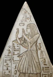 Pyramidion in limestone poses at the top of the chapel tombs in the pyramids
