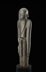Statue of a bearded man wearing a cap and a belt with penis sheath, attributed to the Protodynastic period (c. 2900-2650 BC)