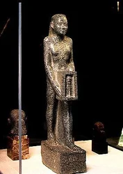 The vizier Psamerikseneb offering a shrine to the bull Mnevis