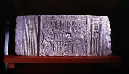 Cornice of a false door from a mastaba-tomb depicting the tomb owner Shery, a high official of Dynasty IV and his wife Khentetka, Saqqara, Old Kingdom