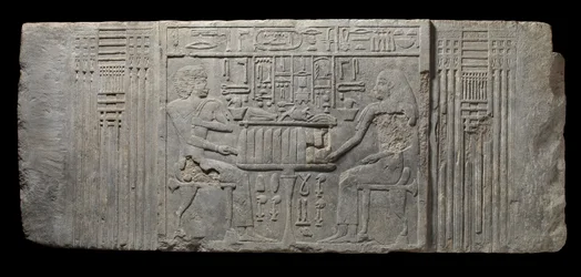 The priest Sheri and his wife Khenteyetka, with funerary offerings, from the Tomb of Sheri, Saqqara, Old Kingdom