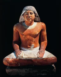 Ancient Egypt: statue of a seated scribe from the necropolis of Saqqara, 5th dynasty, Old Kingdom