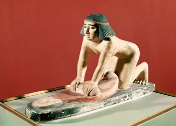 Model of a woman grinding grain, Old Kingdom