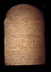 Limestone Stele Representing Pia Worshipping the Crocodile God Sobek Followed by Her Son Iy-Hebnef Making Offerings to the God