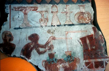 Fragment of a wall painting originally from Thebes, depicting two male figures in the act of preparing or bottling food products in liquid form, 1540-1479 BC