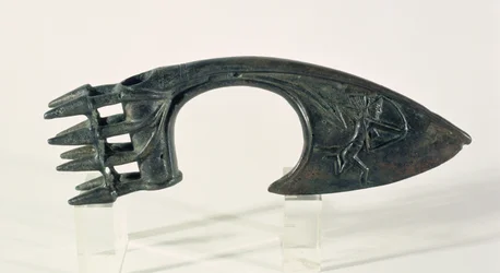 Axe blade depicting an archer, possibly from Lorestan, Iran, late 2nd or early 1st millennium BC